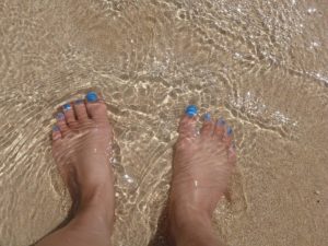 feet on the beach